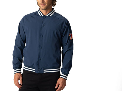 Blue vintage Varsity Bomber Jacket includes tackle twill "74" on the left sleeve, rib-knit collar and cuff, snap front closure, front hand pocket and interior chest pocket, and interior mesh lining.  