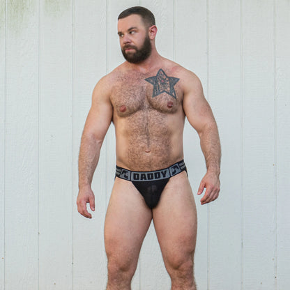Gruff Pup's Daddy Air Jock has a sheer mesh pouch, bulge boost inner enhancing pouch, and says "Daddy" on the thick, comfortable, black band. 