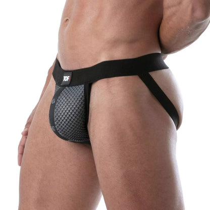 Black and gray snap jockstrap made from breathable 3D mesh.  This jockstrap has a fitted front pocket that snaps in place.