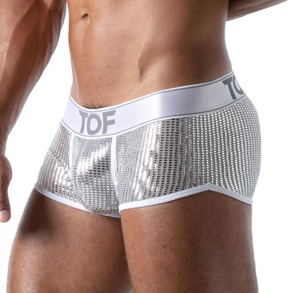 TOF's curved trunks are made of high quality glittery microfibre and have a front pouch and crutch lined in cotton jersey for optimal comfort. They are low-waisted, with a jacquard waistband that features the TOF logo.